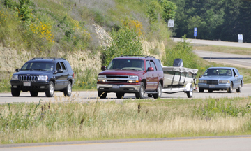 Chevy Tahoe & Boat in Traffic